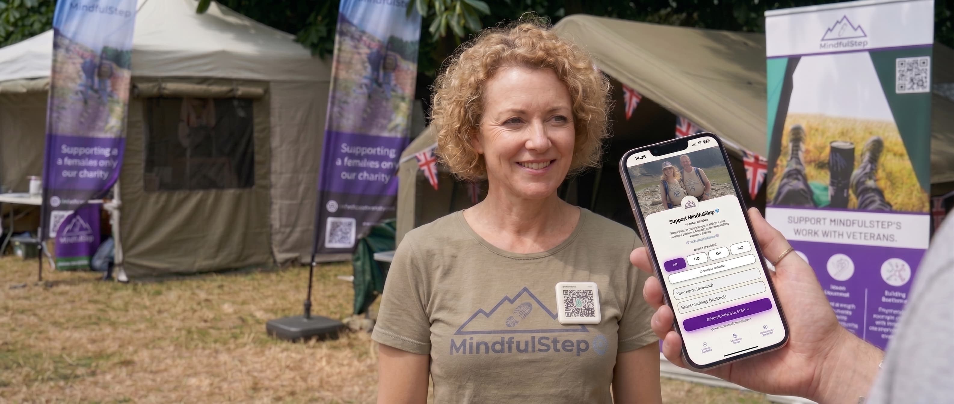 A smartphone scanning a PayPinz smart badge on a volunteer's lanyard